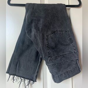 LEVIS 501 raw hemmed cropped jean in a vintage washed black. W25, L26. Premium.
